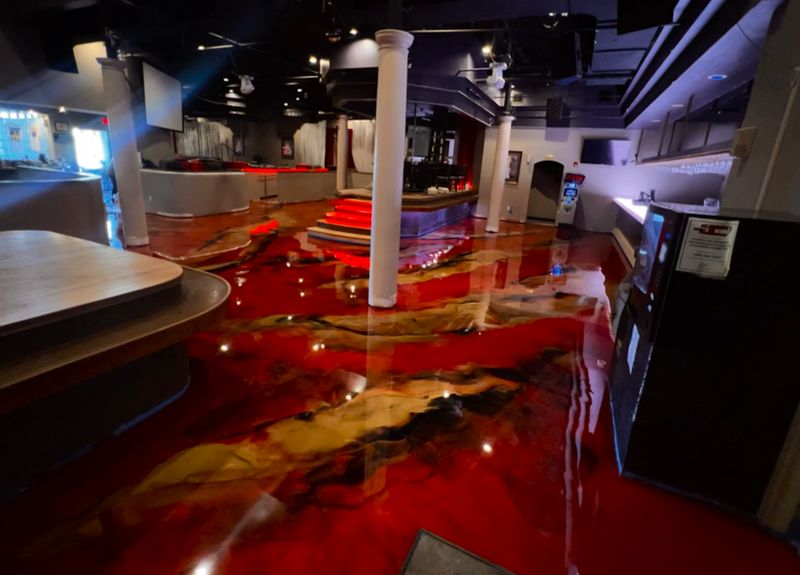 Red and gold metallic epoxy at a venue